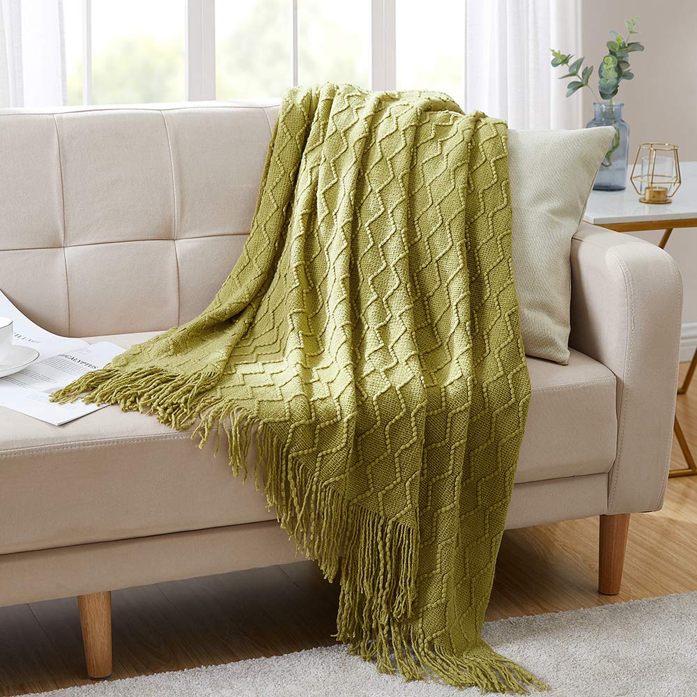 sofa decorated with blanket