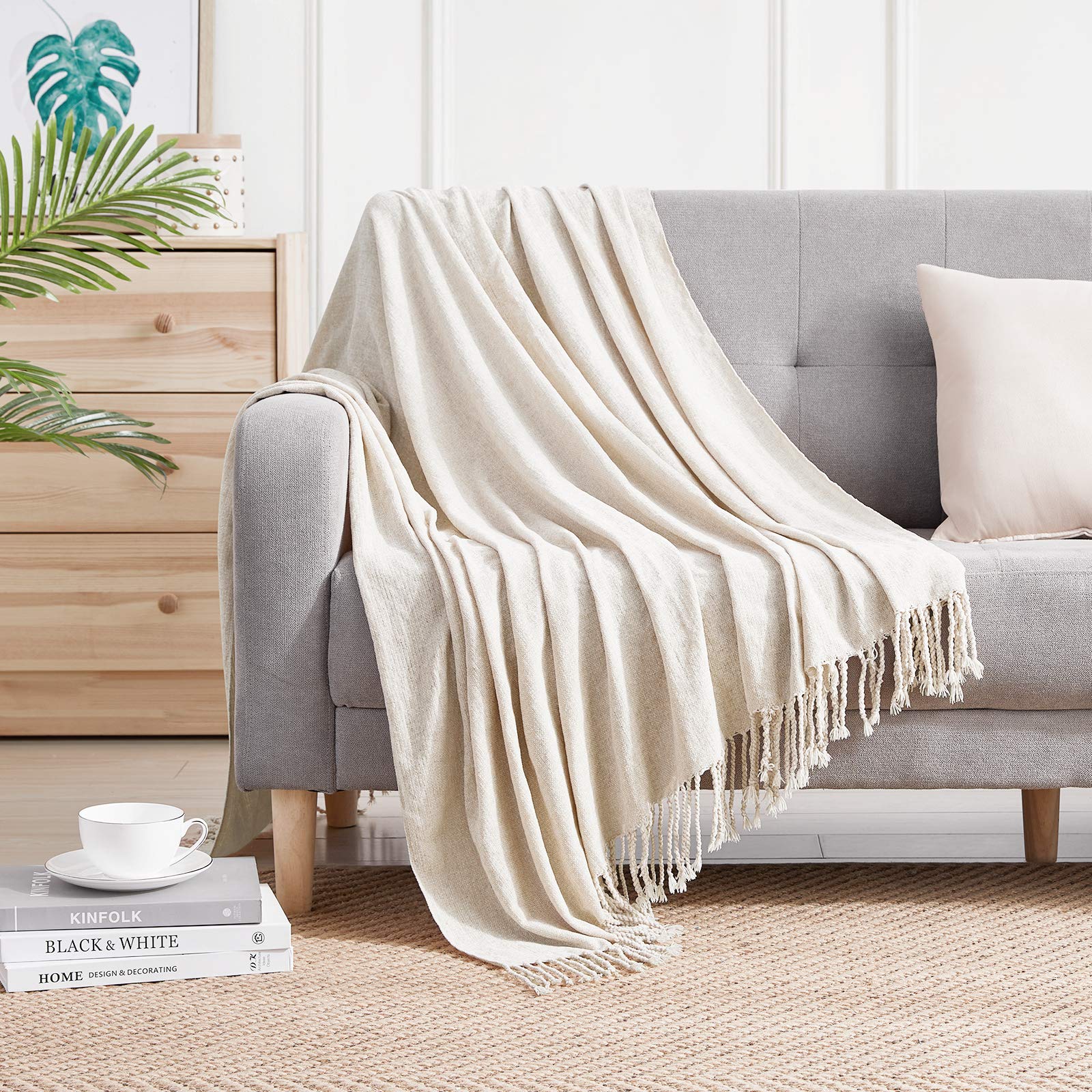 sofa decorated with blanket