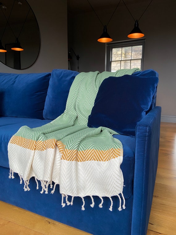 sofa decorated with blanket