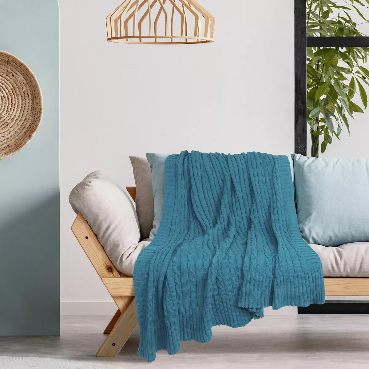 sofa decorated with blanket