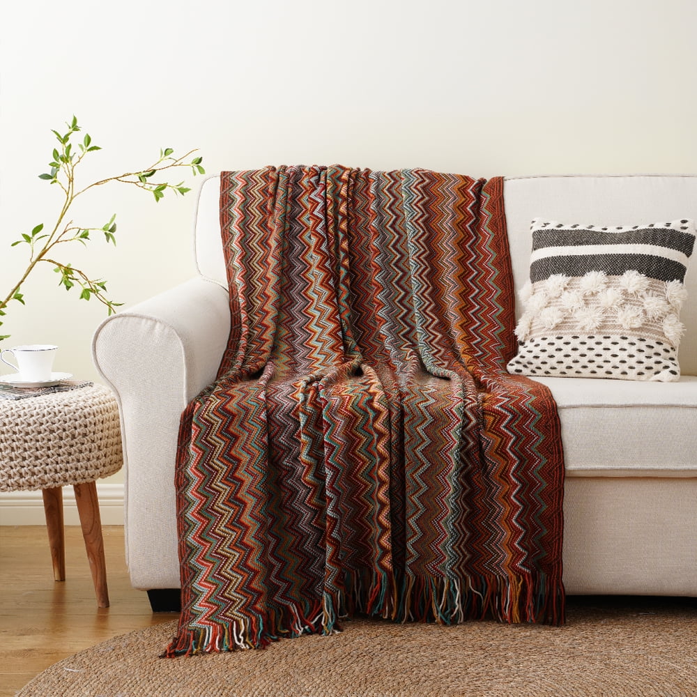 sofa decorated with blanket