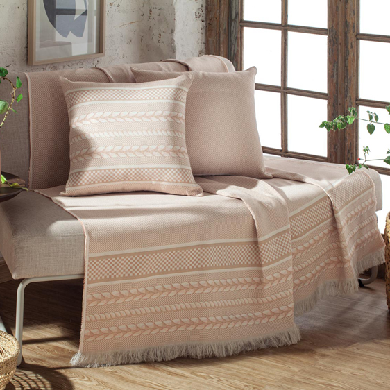 sofa decorado com manta